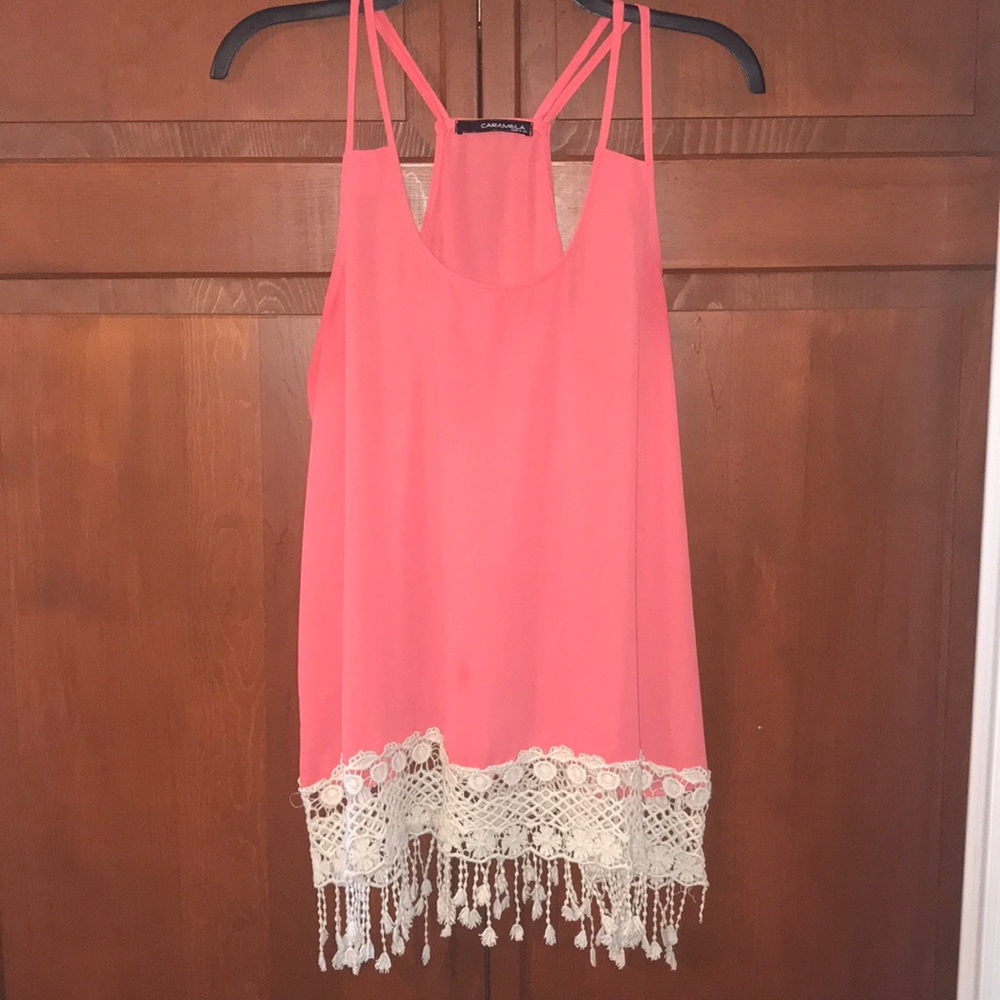 Pink tank top with lace design on bottom